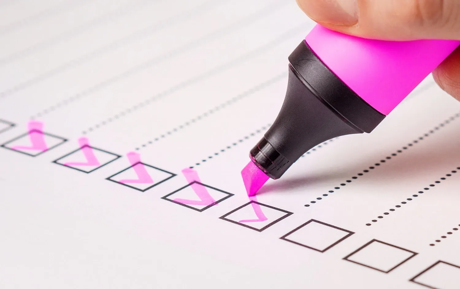 Pen checking boxes on a to-to-list.